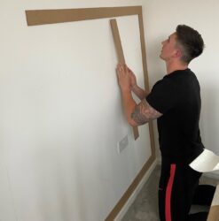 applying panel to wall