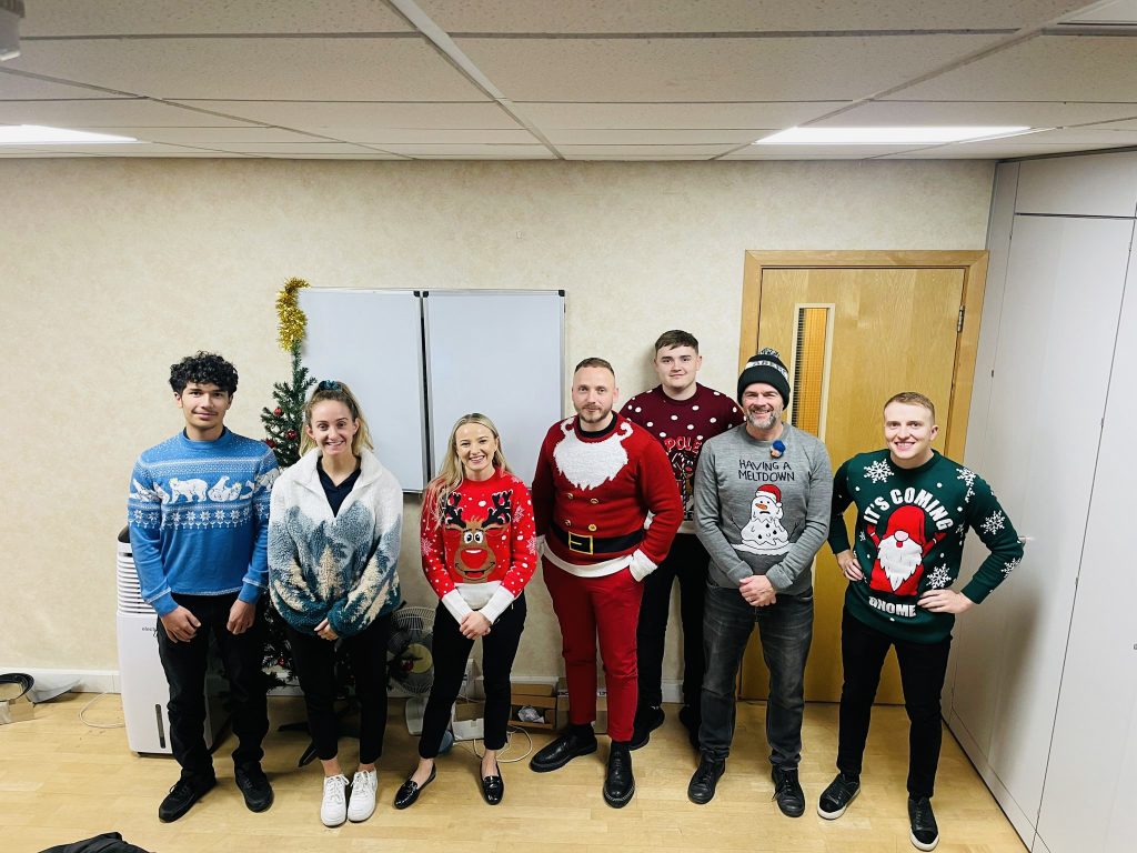 bs fixing team in Christmas jumpers